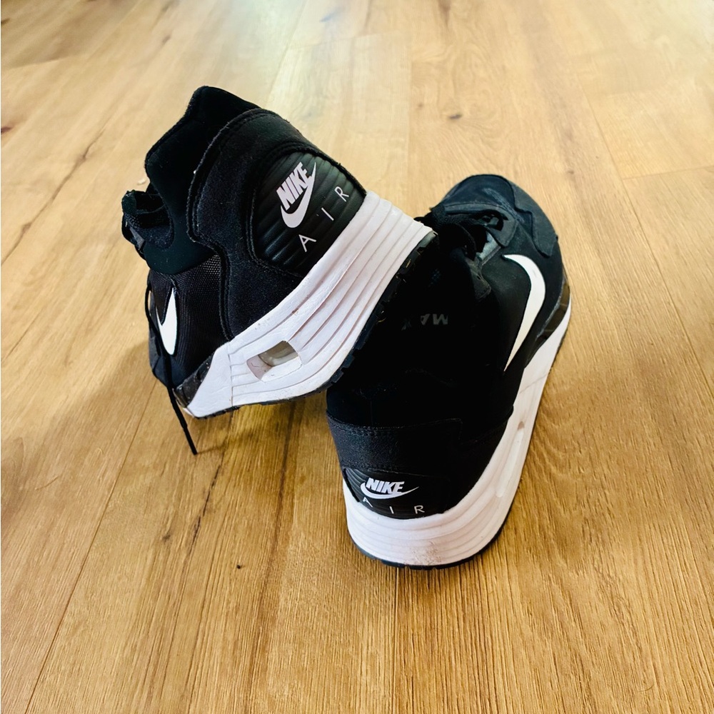 Nike Black High Top Sneakers with White Label